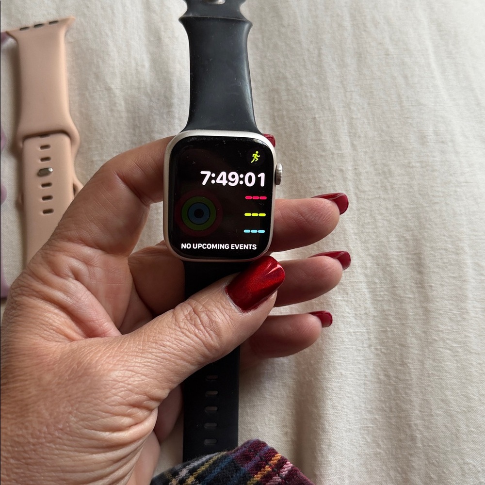 Apple Watch with Black, Purple, and Tan Bands - Picture 3 of 3